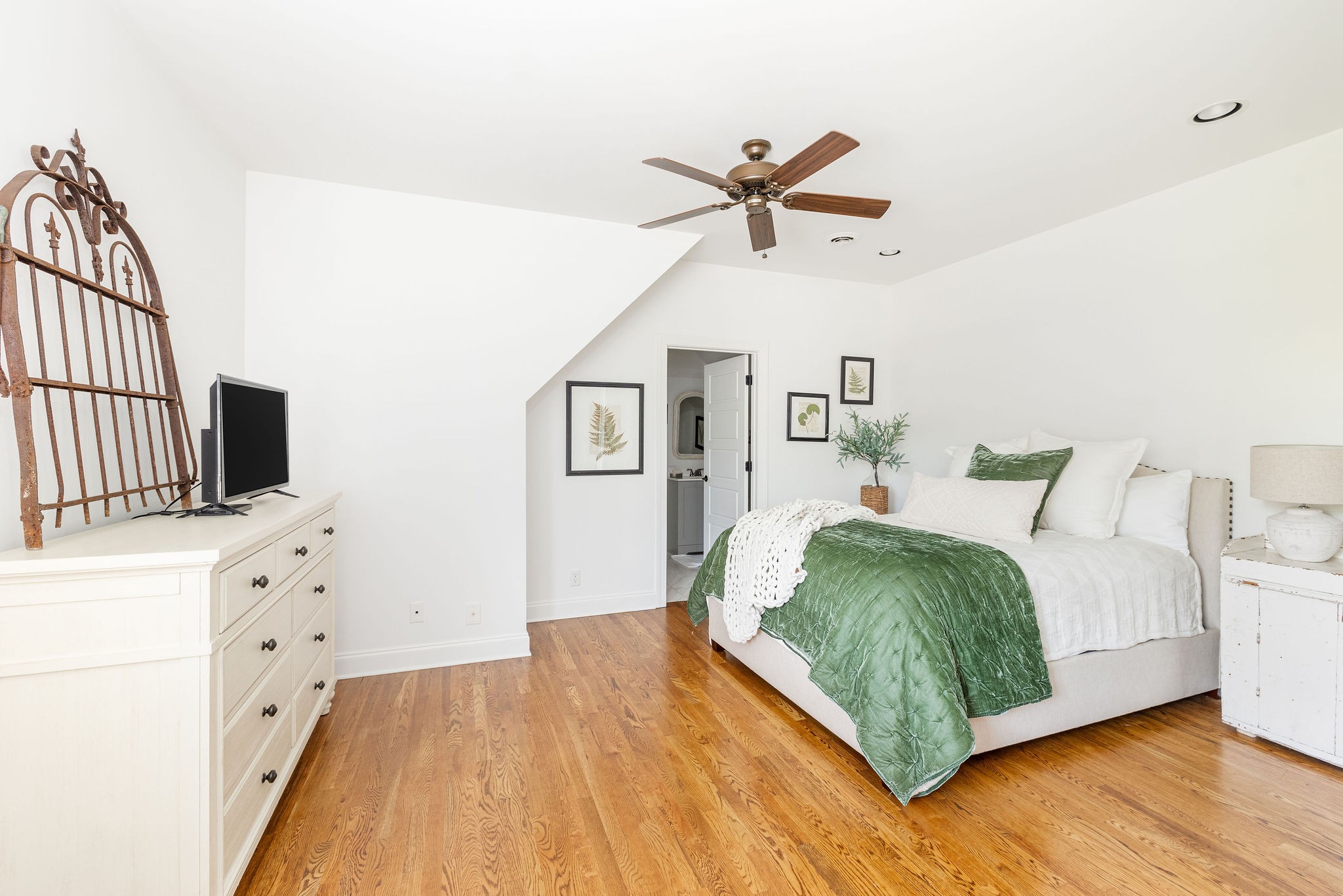 5178 Old Harding Road Franklin, TN 37064 - Photo 31 of 70 a bedroom with a bed and a flat screen tv