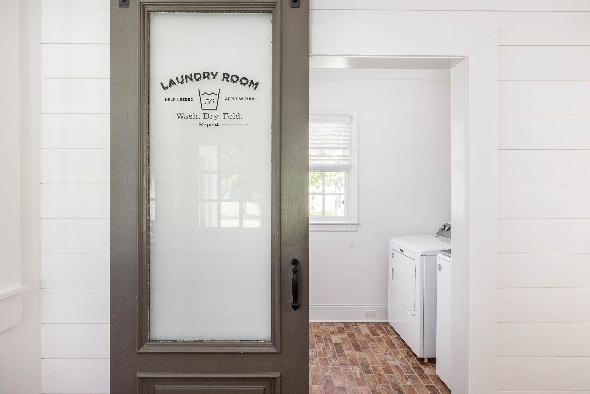 5178 Old Harding Road Franklin, TN 37064 - Photo 34 of 70 a view of a hallway with wooden floor and a bathroom
