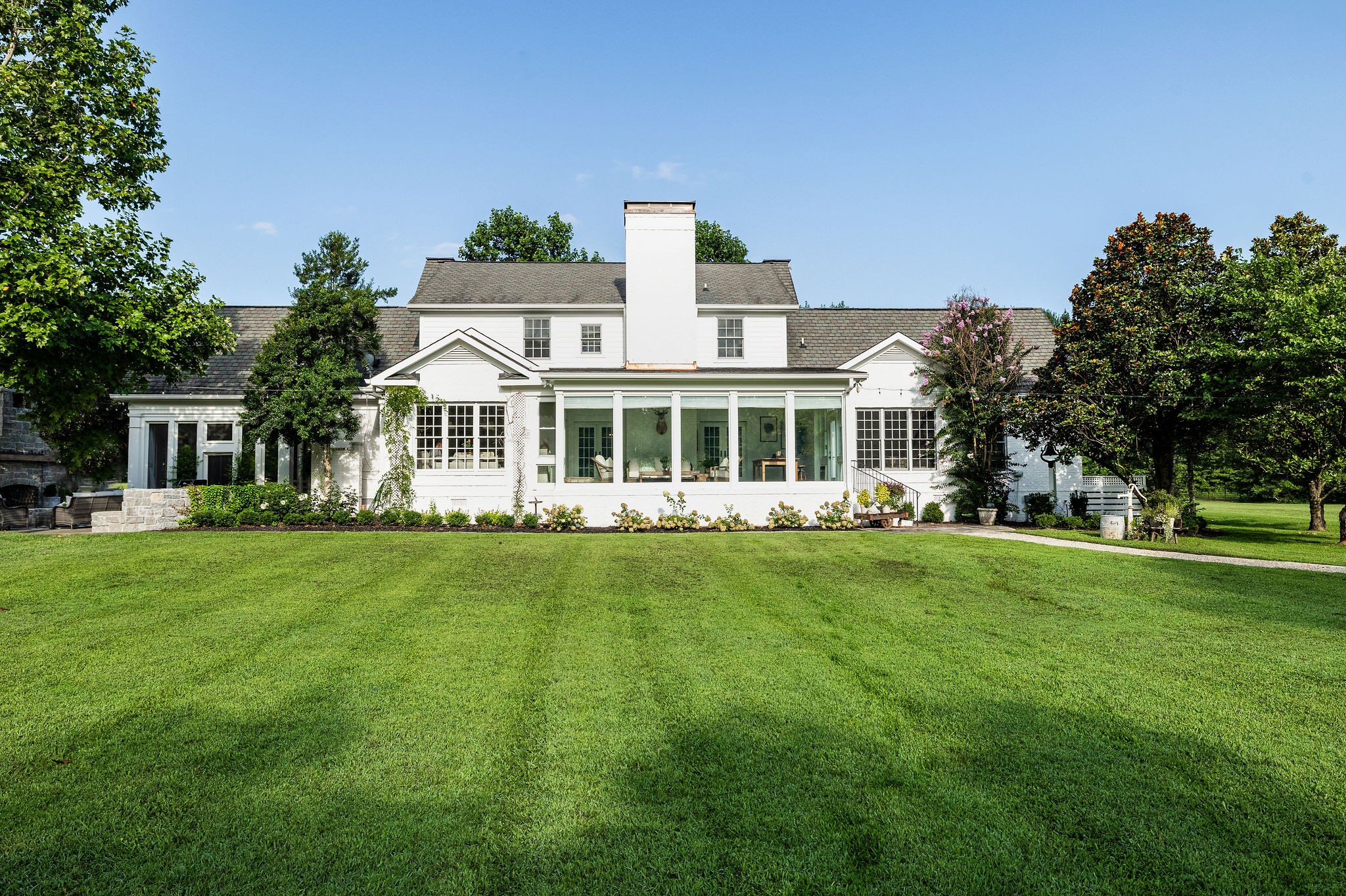 5178 Old Harding Road Franklin, TN 37064 - Photo 44 of 70 a front view of a house with a garden