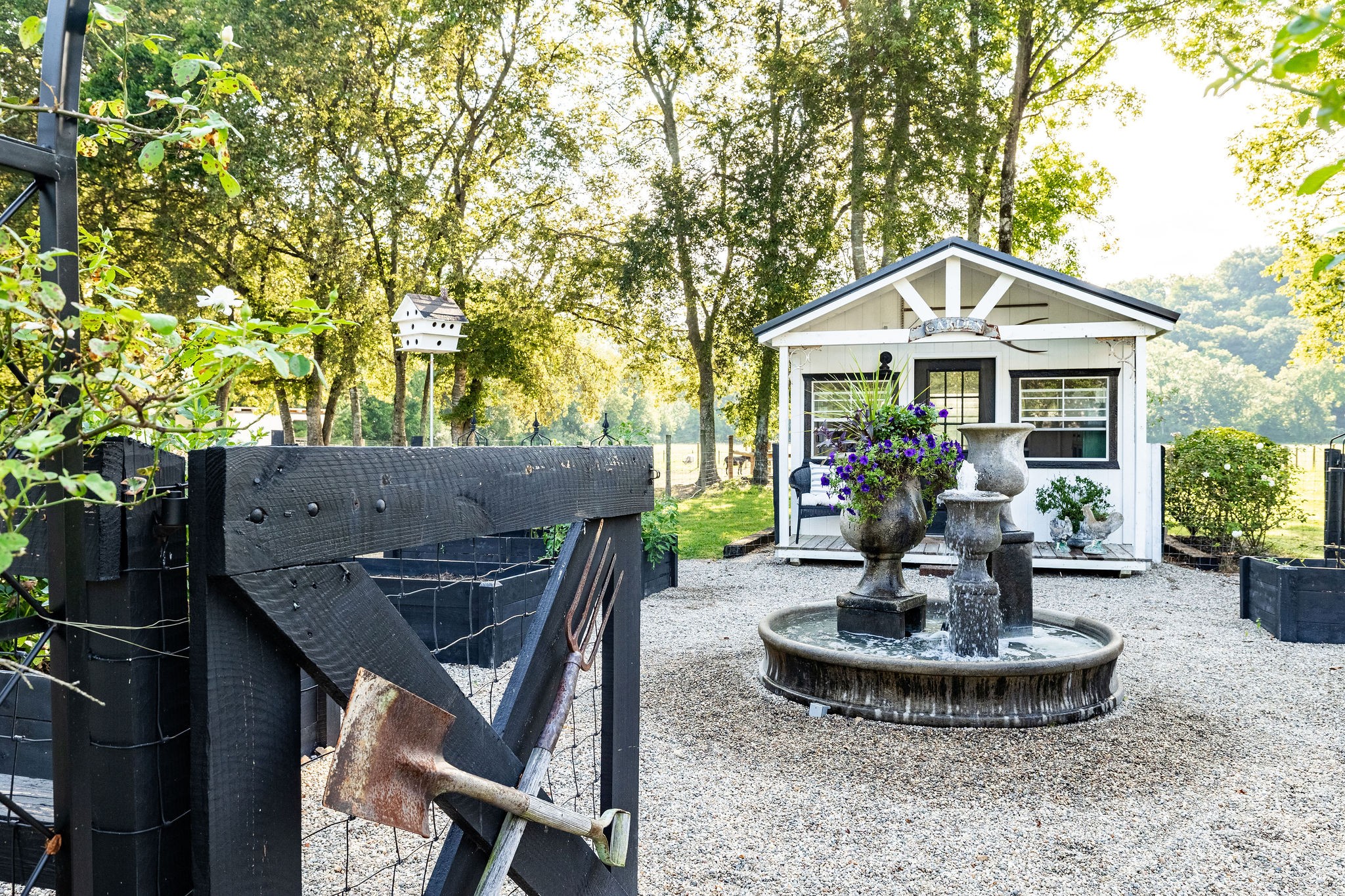 5178 Old Harding Road Franklin, TN 37064 - Photo 52 of 70 a front view of a house with a yard fire pit and outdoor seating