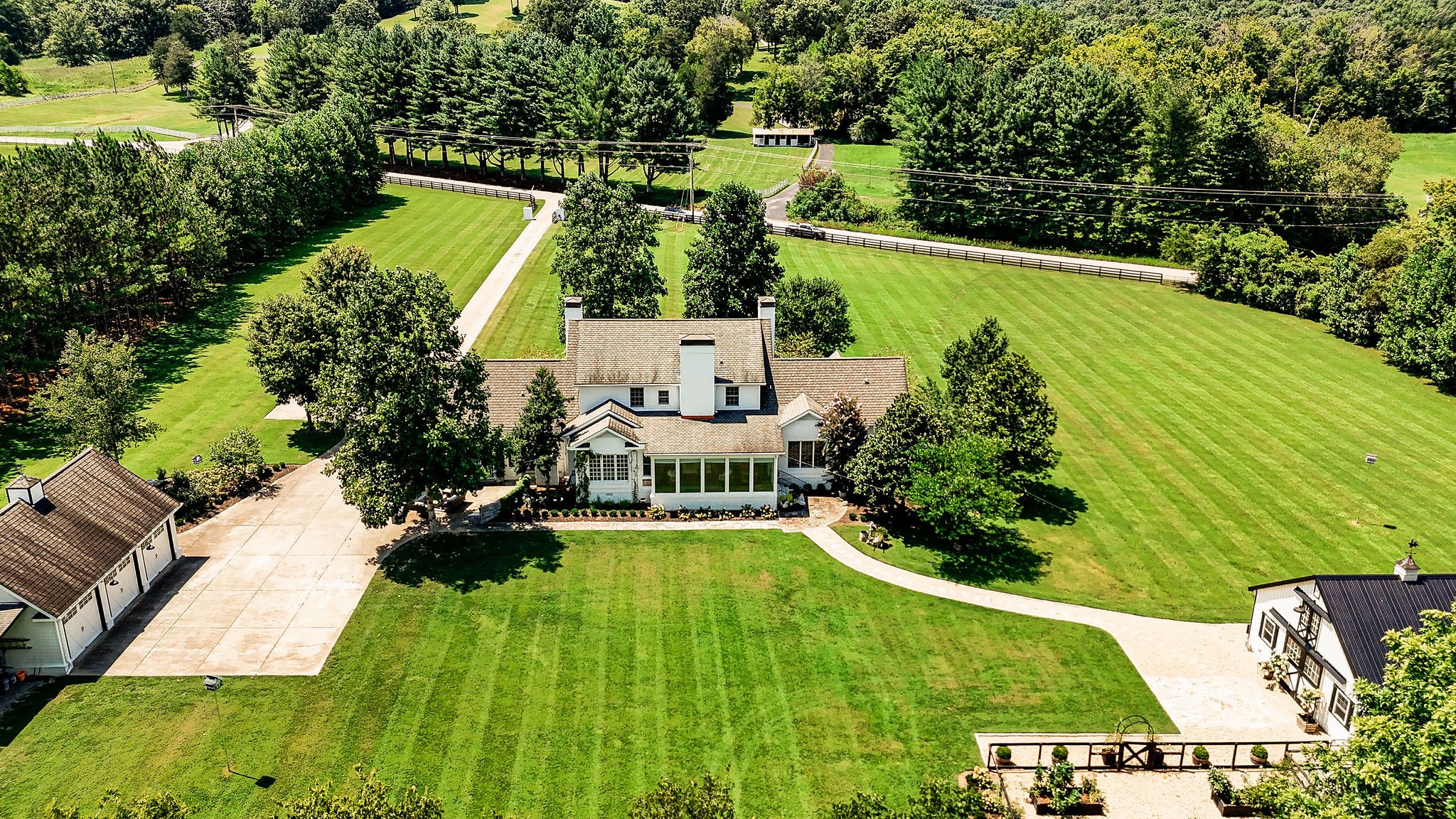 5178 Old Harding Road Franklin, TN 37064 - Photo 62 of 70 an aerial view of a house with a yard swimming pool and outdoor seating