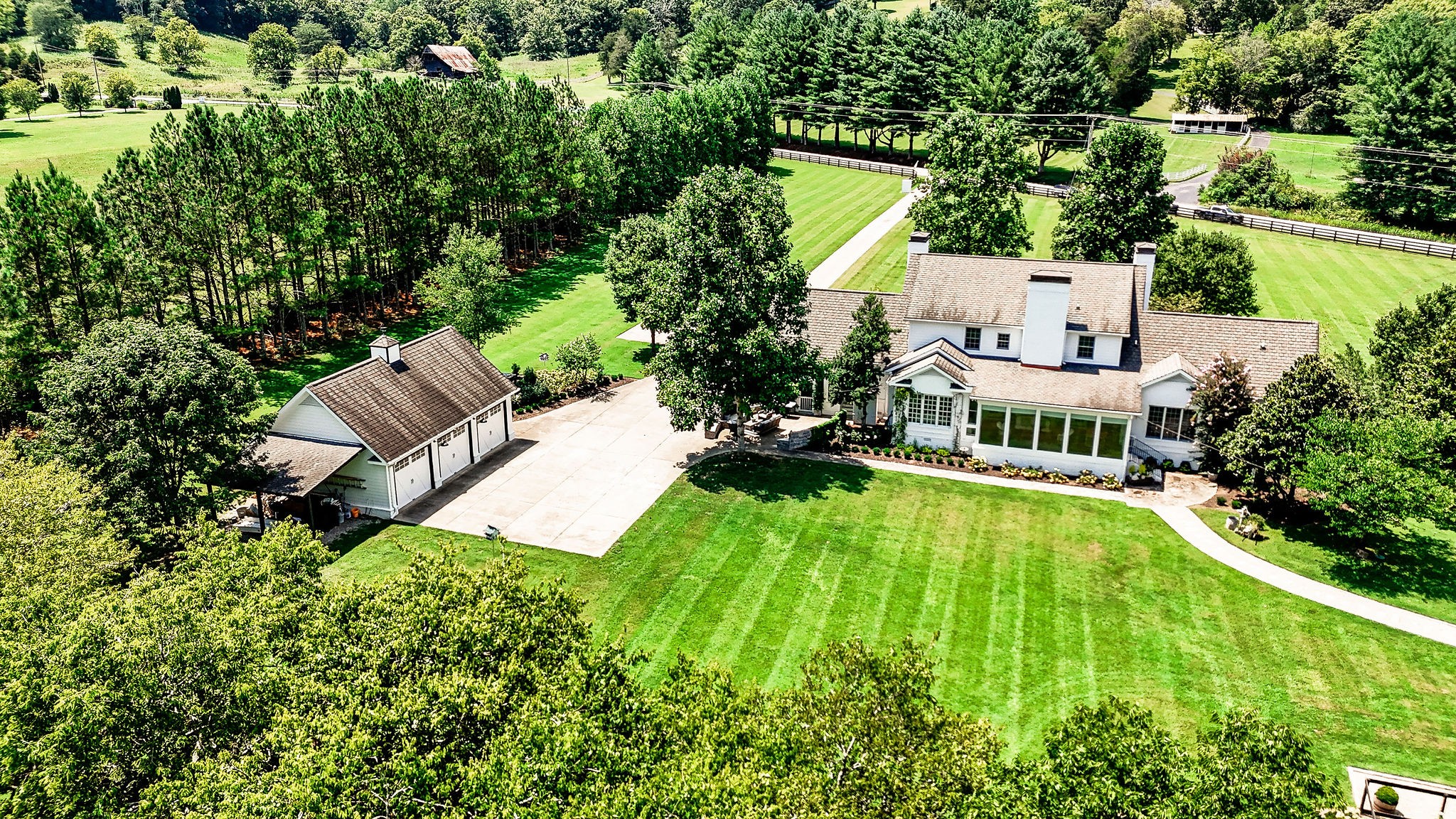 5178 Old Harding Road Franklin, TN 37064 - Photo 64 of 70 a view of a house with a yard patio and sitting area