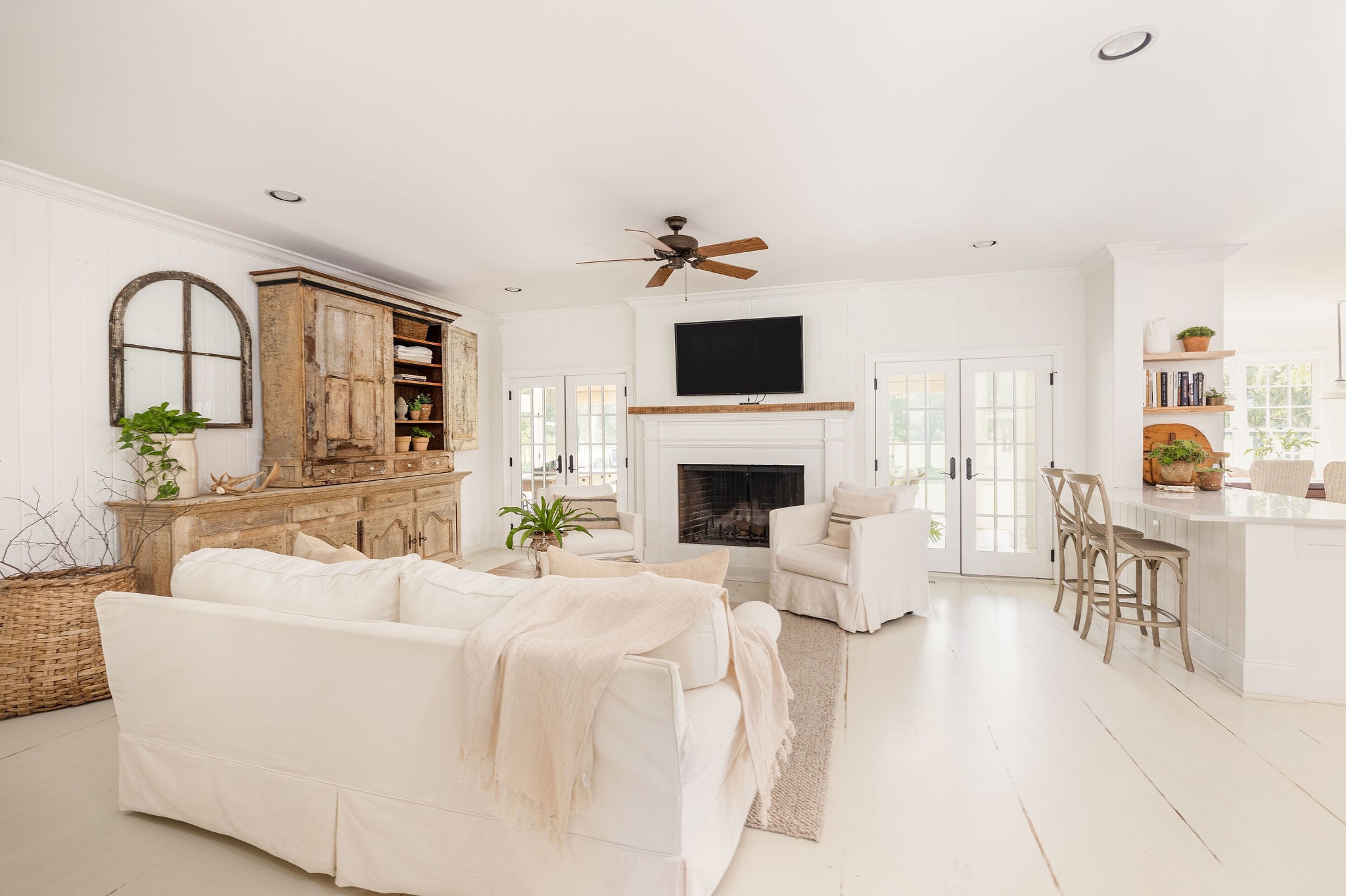 5178 Old Harding Road Franklin, TN 37064 - Photo 10 of 70 a living room with furniture a fireplace and a flat screen tv