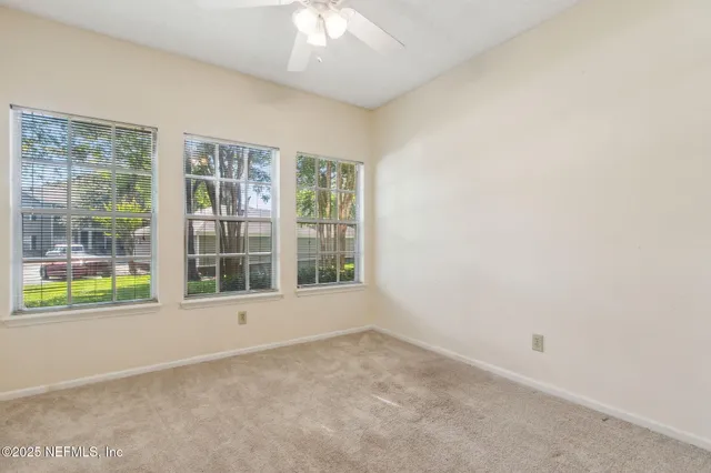 an empty room with a bathroom