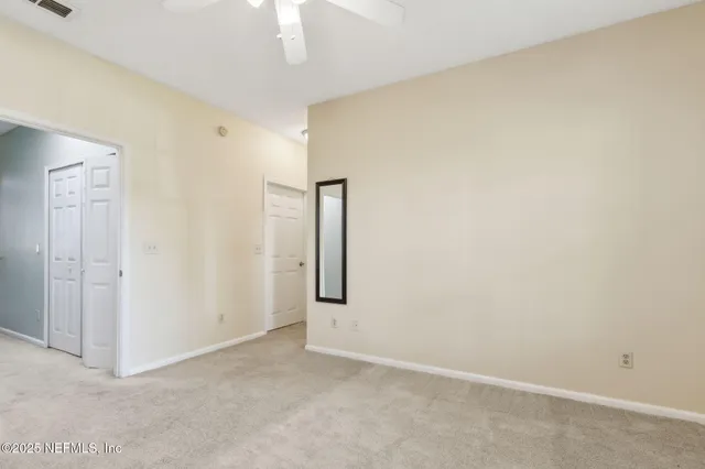 a view of storage and utility room with washer and dryer