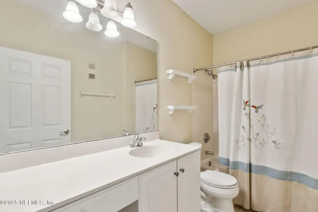 a view of house with a garden