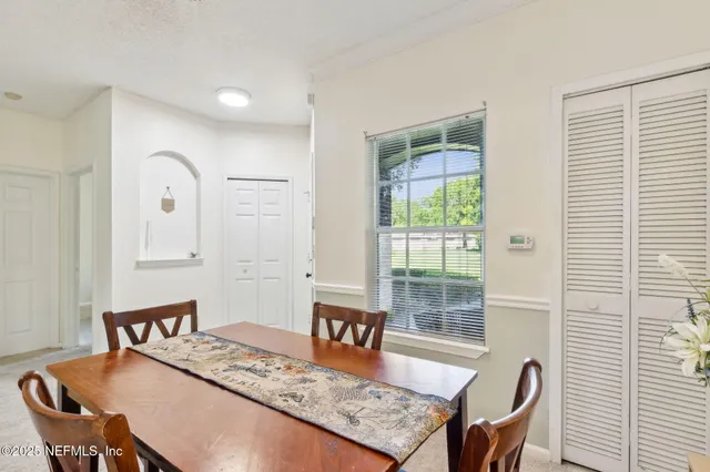 a white refrigerator freezer sitting inside of a kitchen