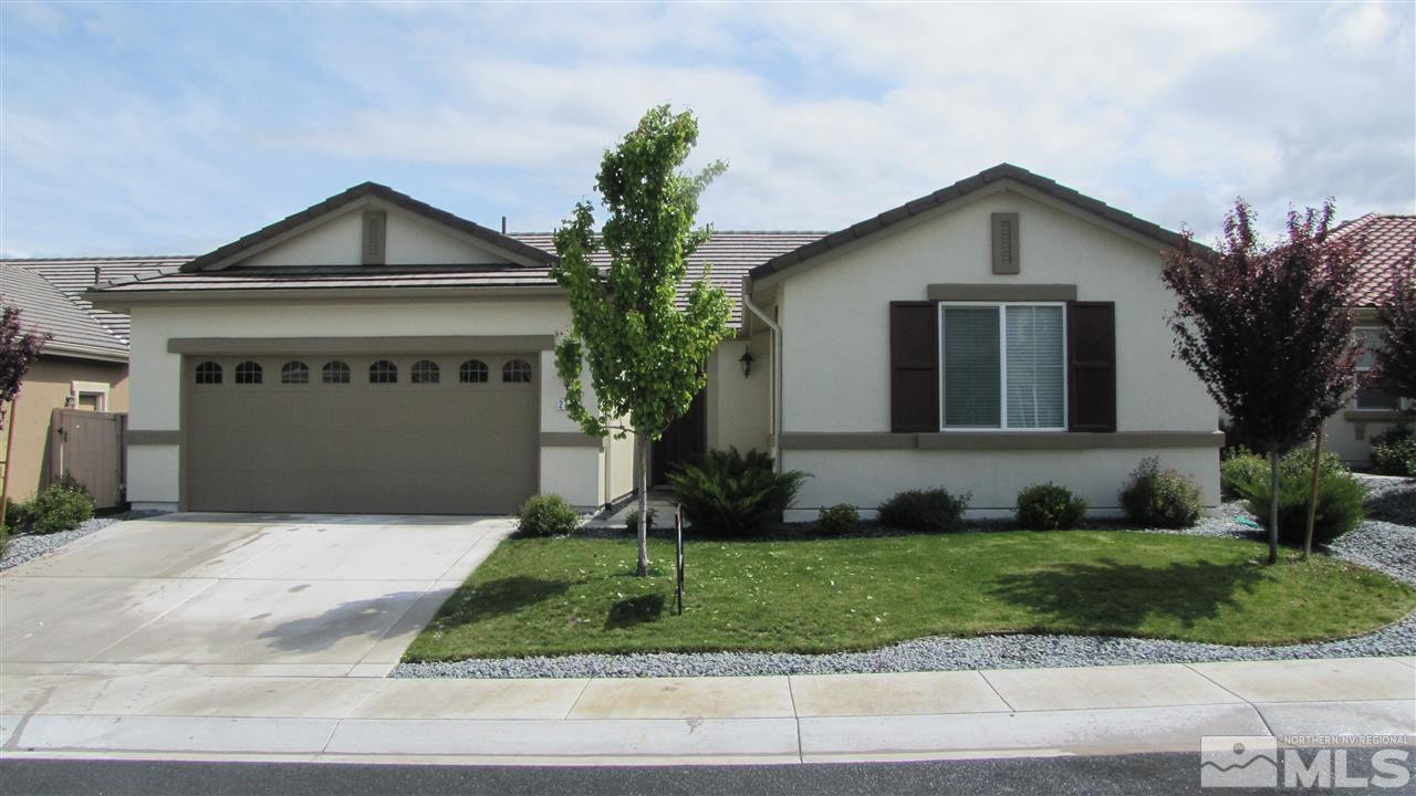2179 Huntsdale Drive Reno, NV 89521 - Photo 1 of 1 a front view of a house with a yard and garage