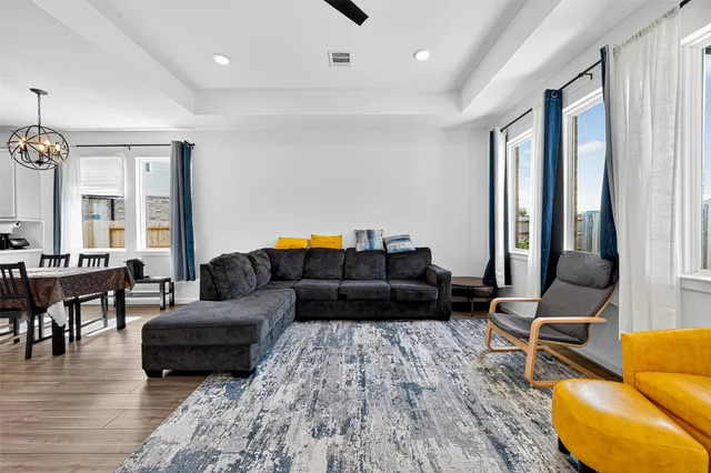 a living room with furniture and a couch