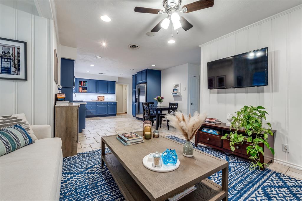 4159 Clover Lane Dallas, TX 75220 - Photo 11 of 25 Living area with ceiling fan, recessed lighting, a decorative wall, and baseboards
