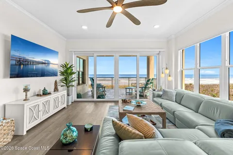 a large kitchen with kitchen island a large counter space a sink appliances and cabinets