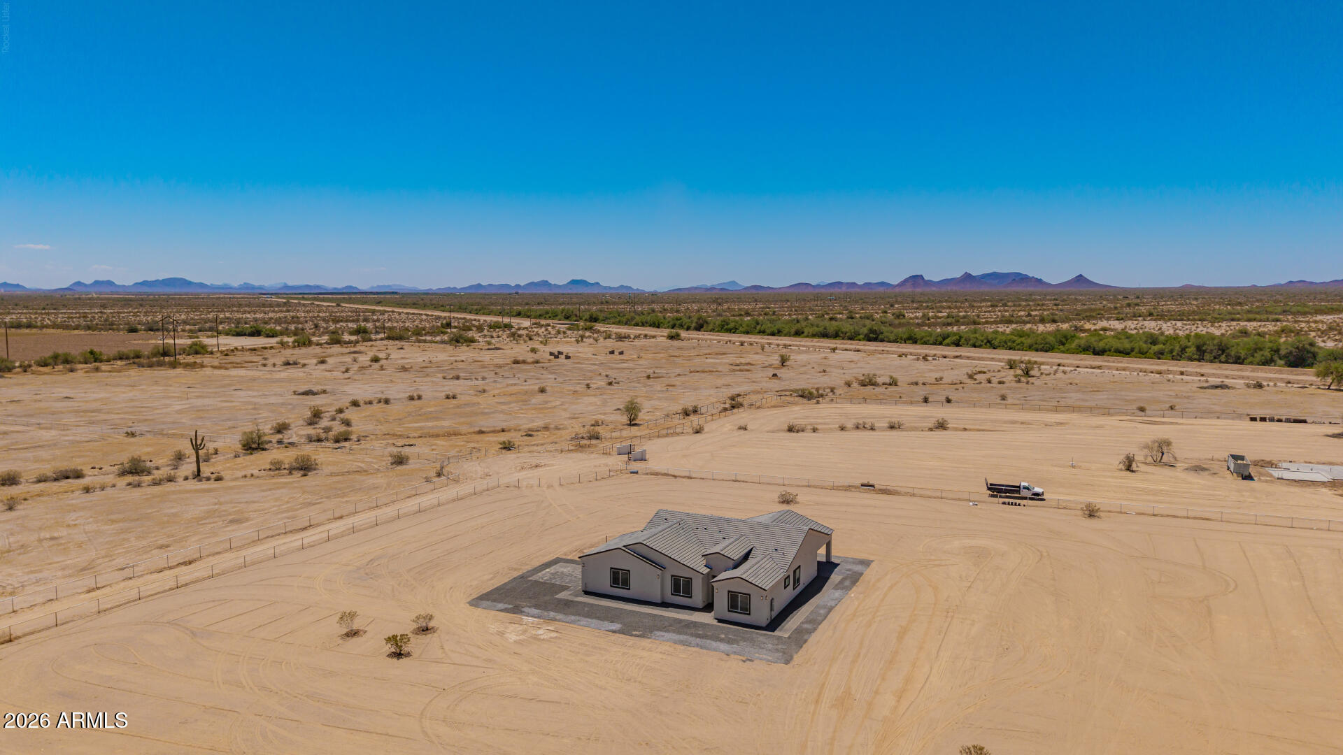 40461 West Robles Road Stanfield, AZ 85172 - Photo 12 of 54 a view of an ocean beach and mountain
