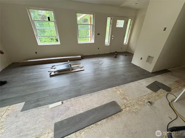 an empty room with windows