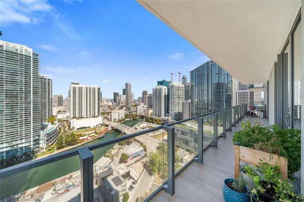 a view of a balcony with city view