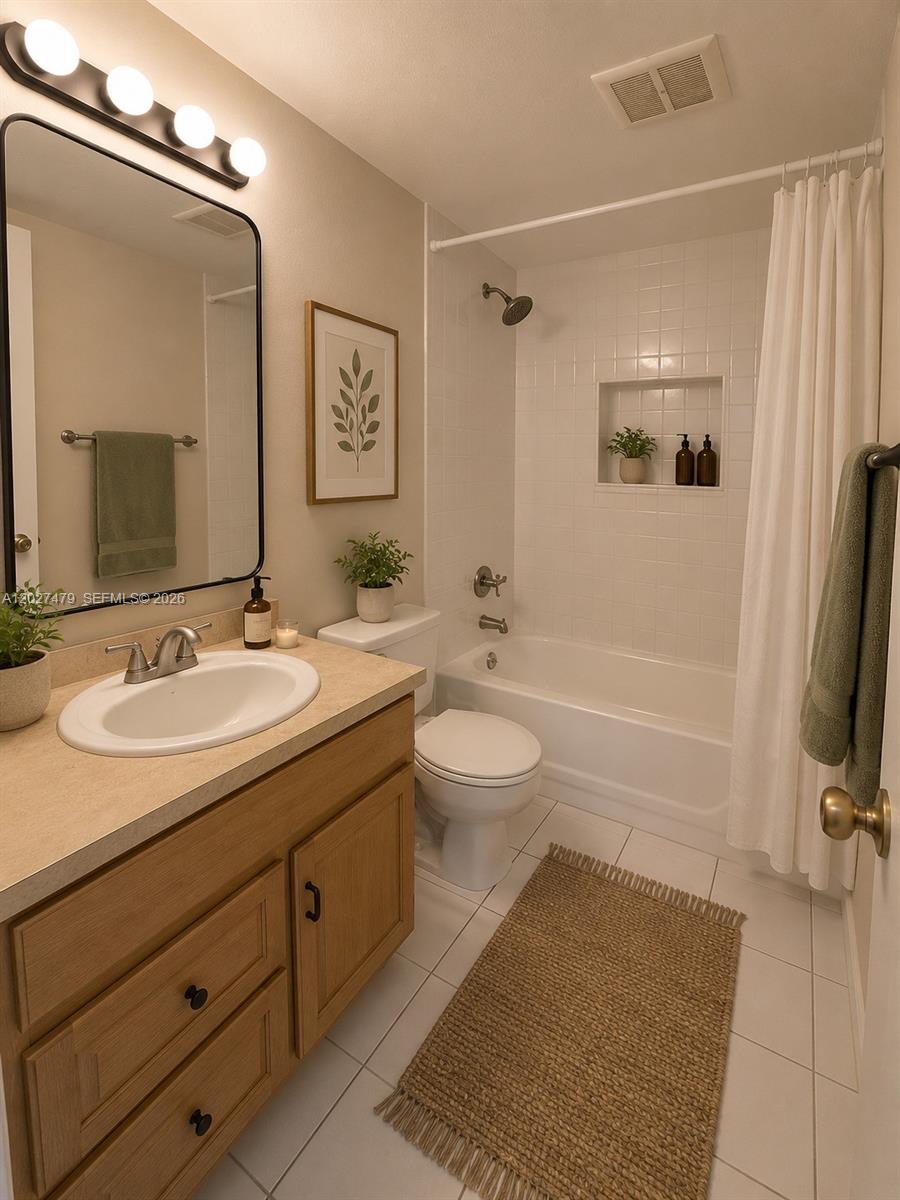 405 South Pine Island Road, Unit 308D Plantation, FL 33324 - Photo 9 of 14 a bathroom with a sink double vanity granite tub and a mirror
