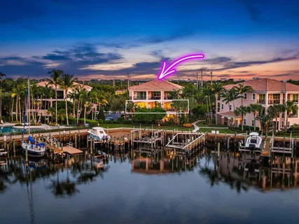a view of a chairs and tables in patio