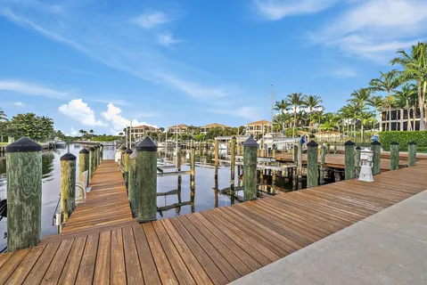 a view of a balcony with wooden floor