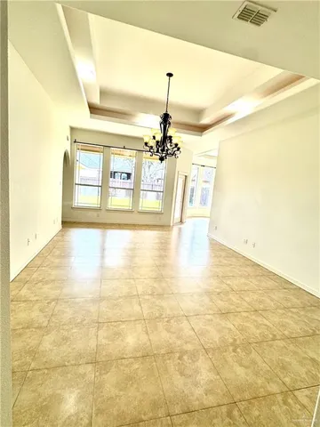 a view of hallway with a large window