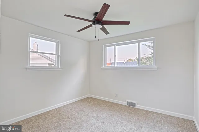 a workspace with furniture and wooden floor