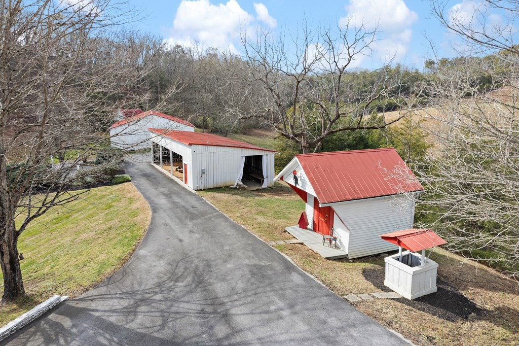 933 Millican Grove Road Sevierville, TN 37876 - Photo 49 of 54 a view of a backyard with sitting area