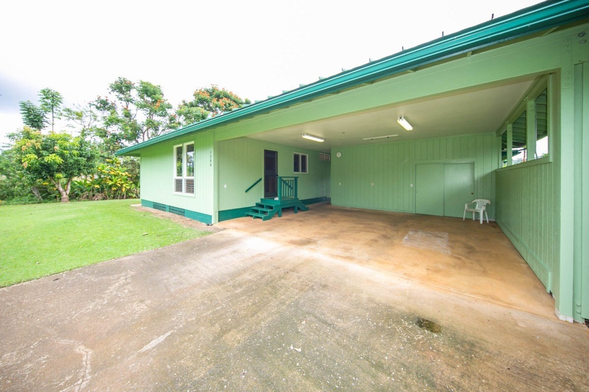 1200 Puuopae Road, Unit B Kapaa, HI 96746 - Photo 16 of 29 a view of a house with a backyard