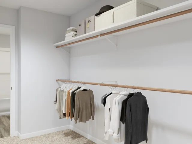 a view of a swimming pool with a table and chairs