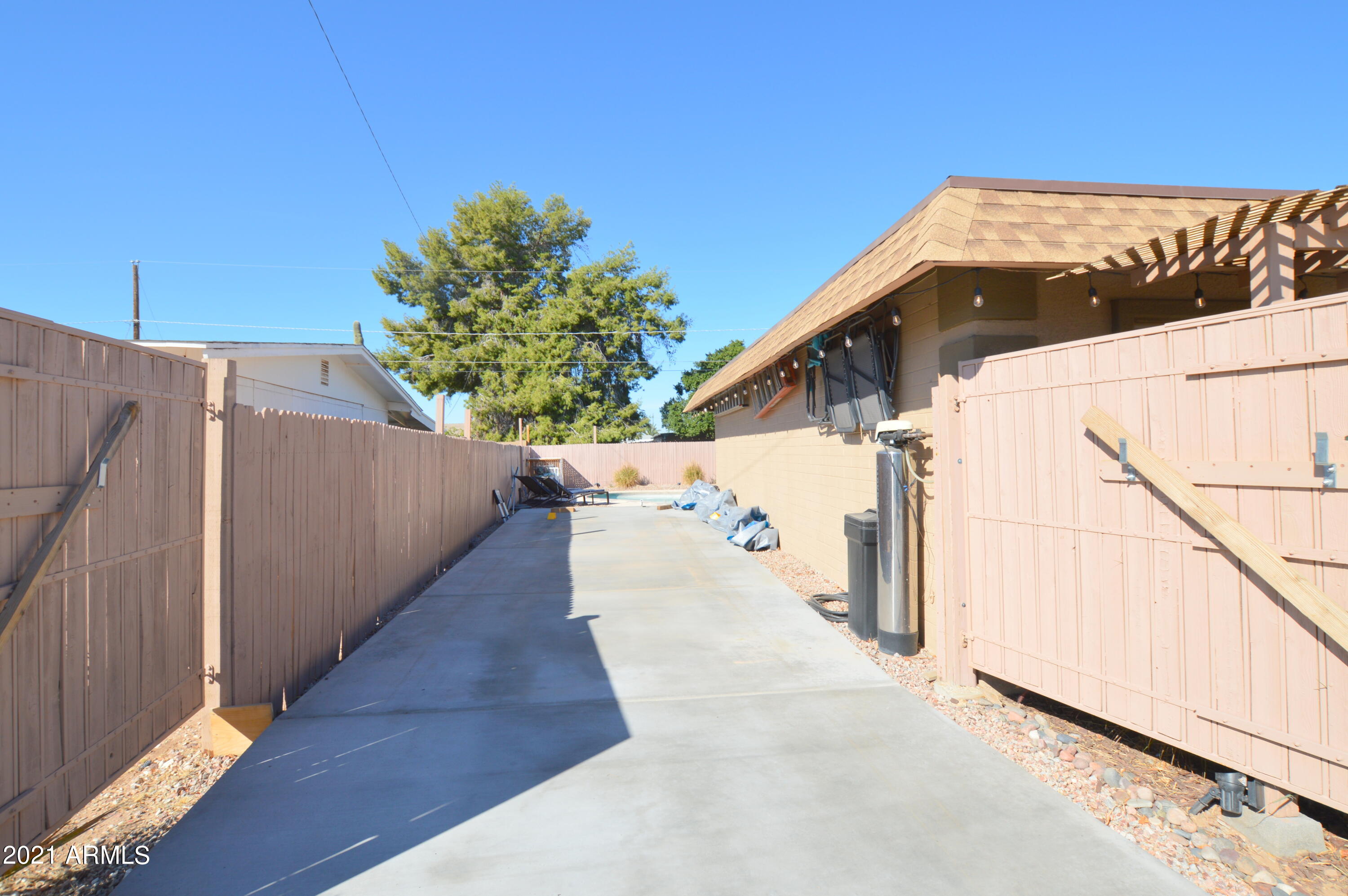 1702 North Trevor Mesa, AZ 85201 - Photo 26 of 37 1702 Trevor Yard RV from front