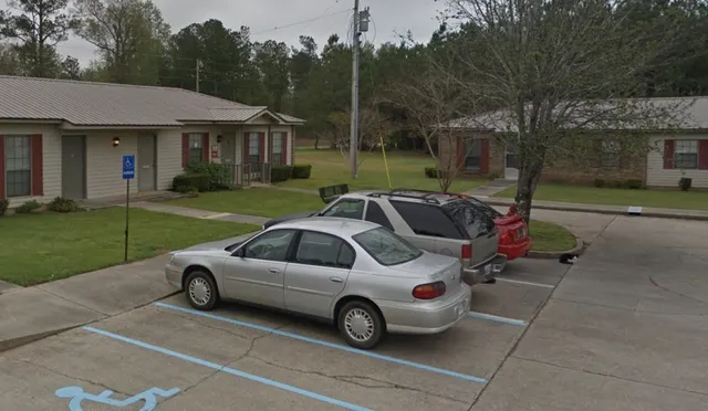 a car parked in front of a house