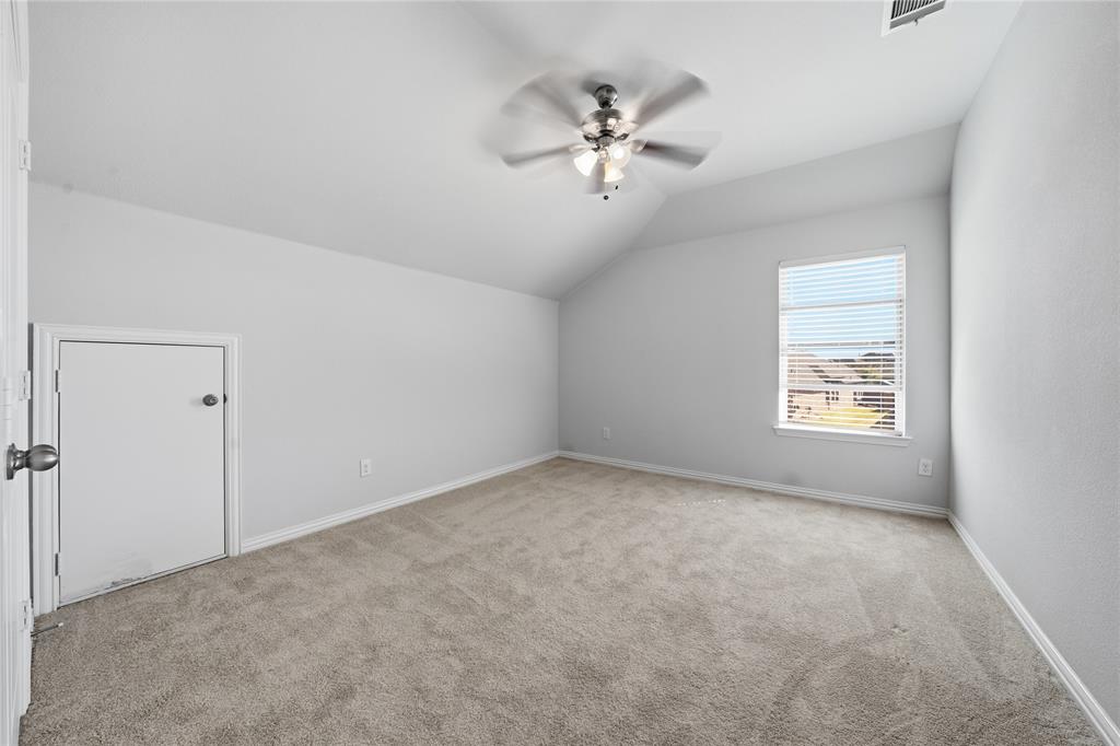 4542 Kipling Avenue Aubrey, TX 76227 - Photo 24 of 34 a view of an empty room with a window