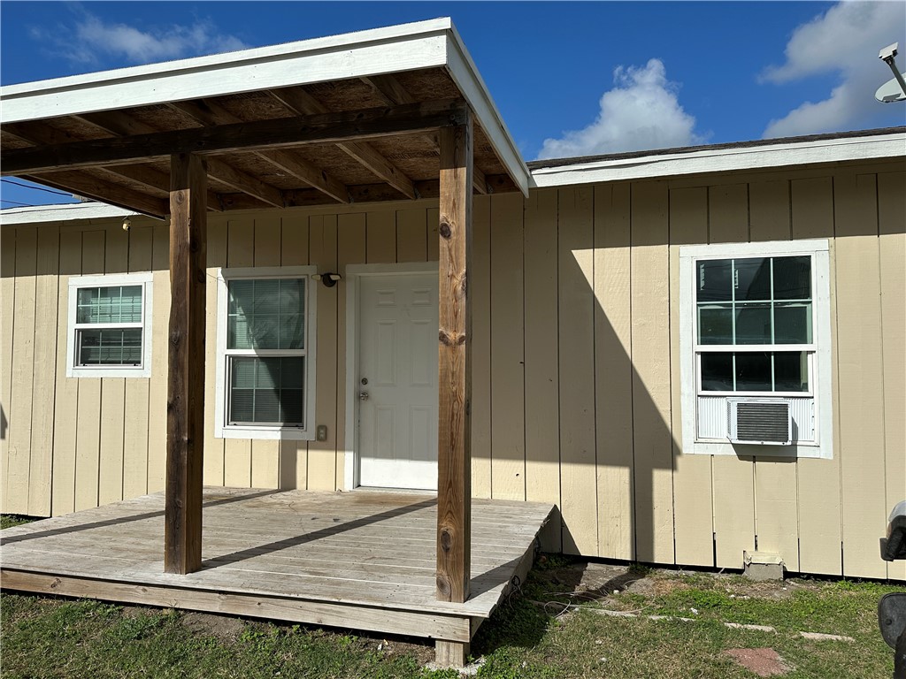 10837 Leopard Street, Unit A Corpus Christi, TX 78410 - Photo 1 of 7 a house view with a backyard space