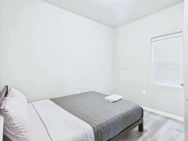 a bedroom with a bed