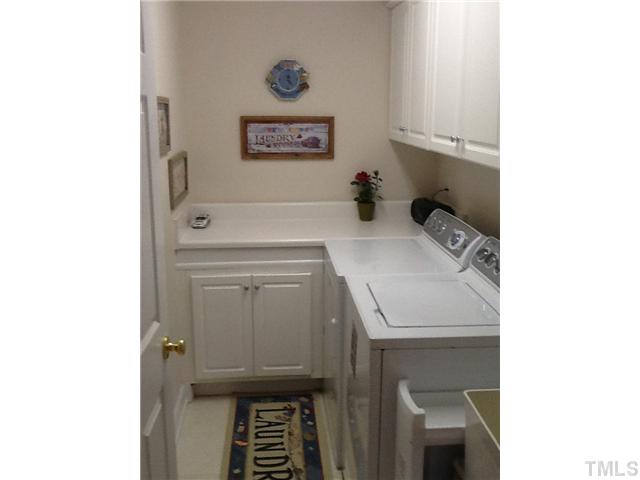 1609 Stannard Trail Raleigh, NC 27612 - Photo 13 of 25 a bathroom with a sink and a mirror
