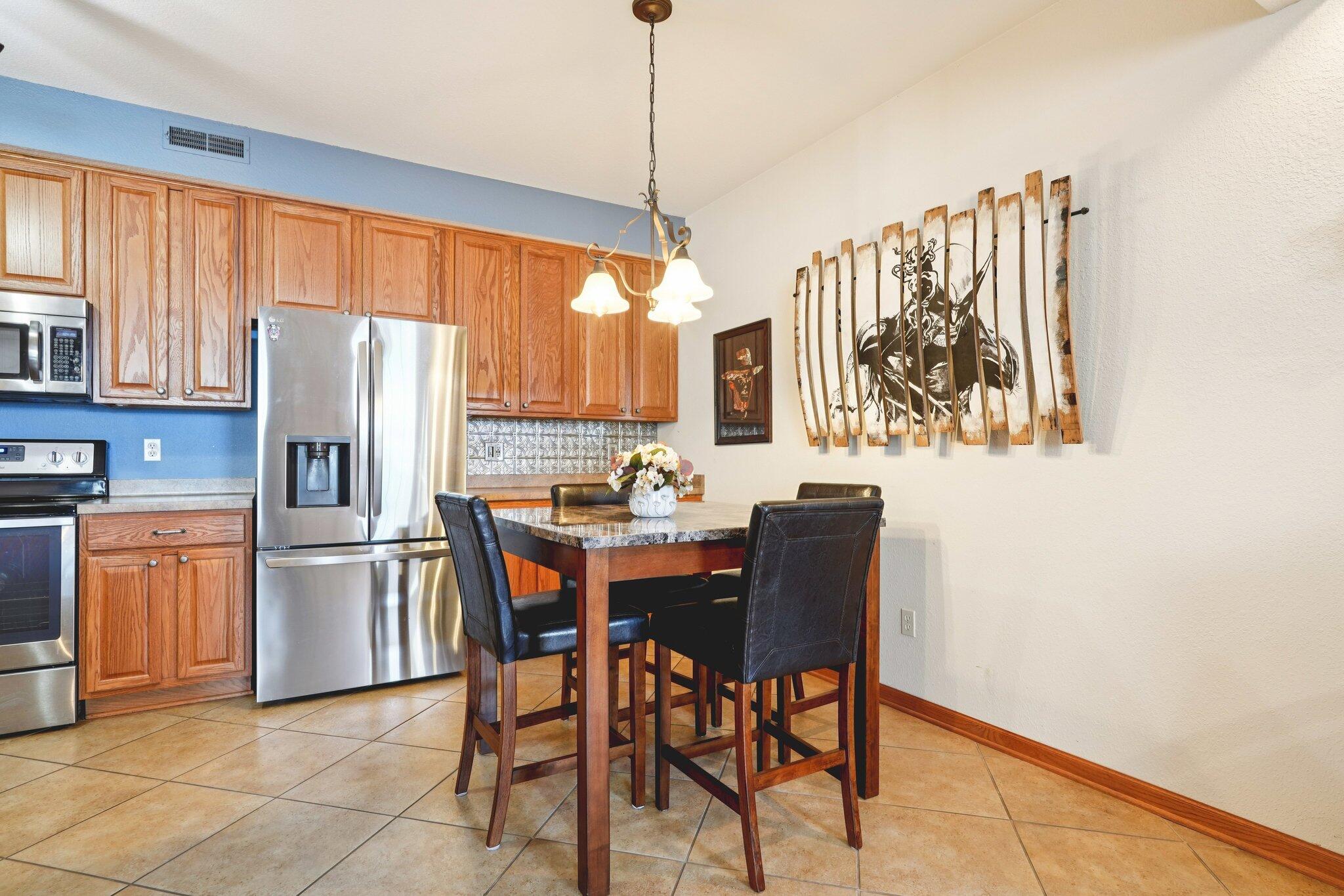 1620 Grey Fox Trail, Unit D Mukwonago, WI 53149 - Photo 12 of 35 Tiled floor, refrigerator new in 2024!