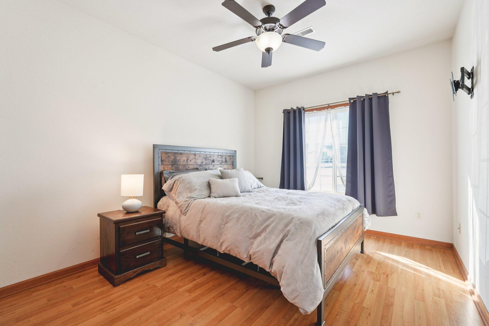 1620 Grey Fox Trail, Unit D Mukwonago, WI 53149 - Photo 18 of 35 Laminate flooring, double door closet, ceiling fan with light.