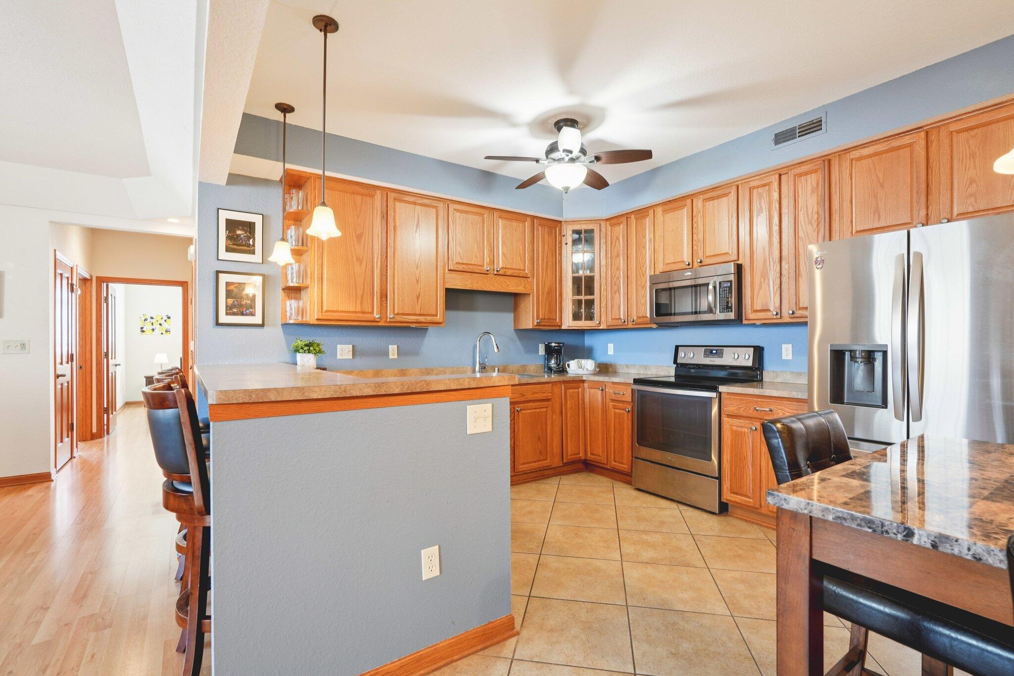 1620 Grey Fox Trail, Unit D Mukwonago, WI 53149 - Photo 28 of 35 Loads of cabinets and counters, corner glass cabient.
