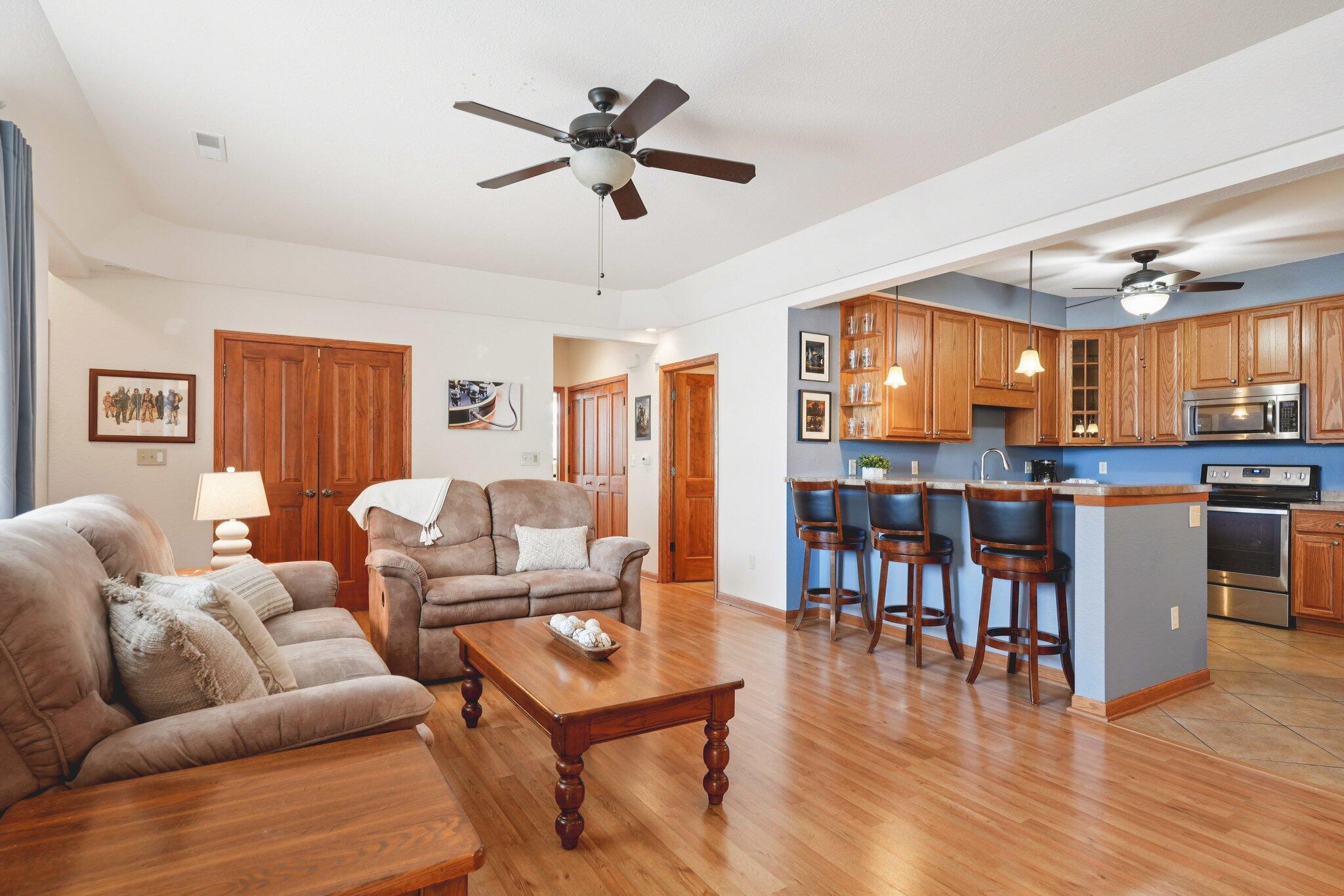 1620 Grey Fox Trail, Unit D Mukwonago, WI 53149 - Photo 3 of 35 Laminate flooring, 6 panel doors.