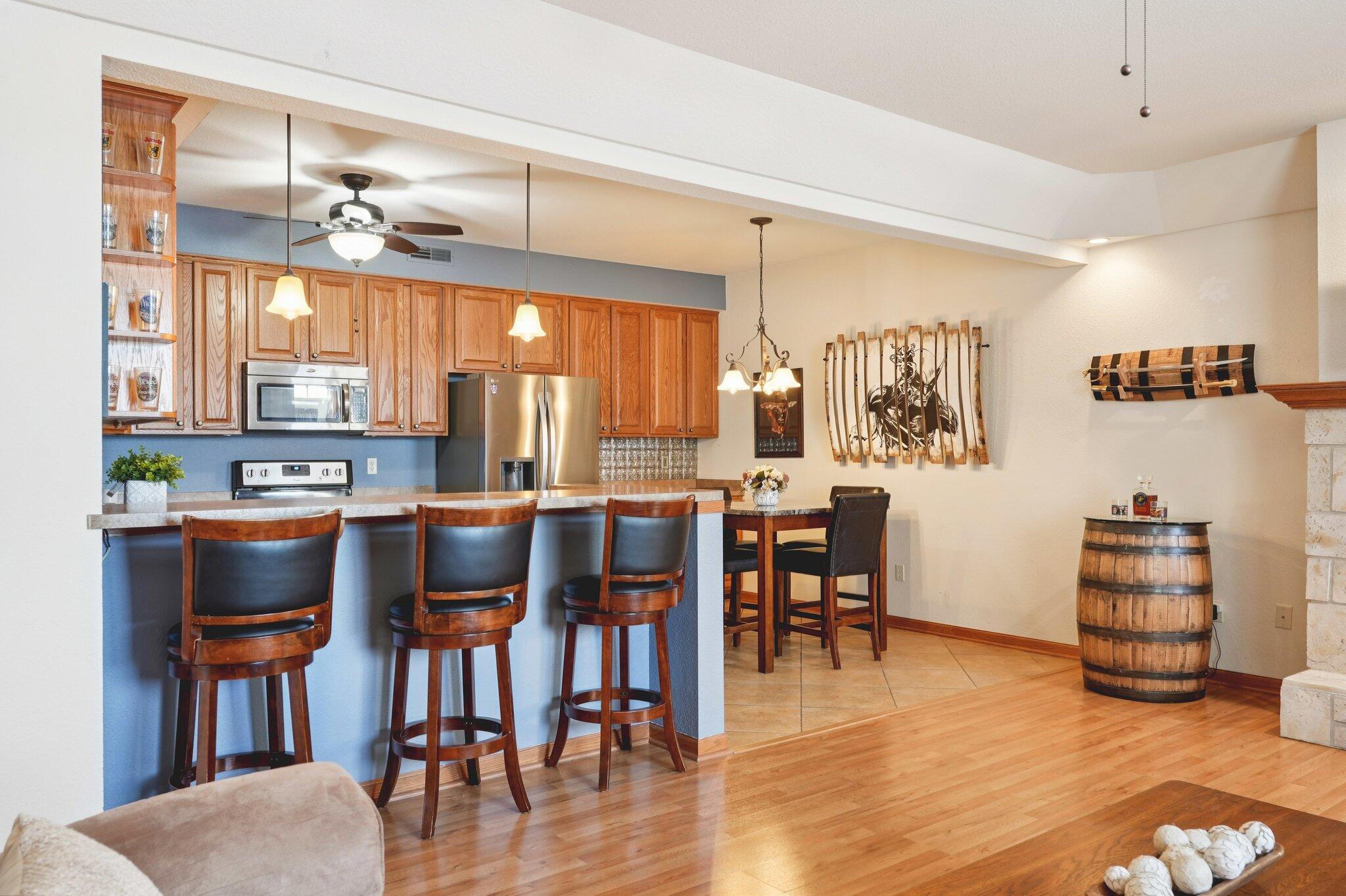 1620 Grey Fox Trail, Unit D Mukwonago, WI 53149 - Photo 9 of 35 Plenty of cabinets, breakfast bar and dining area.