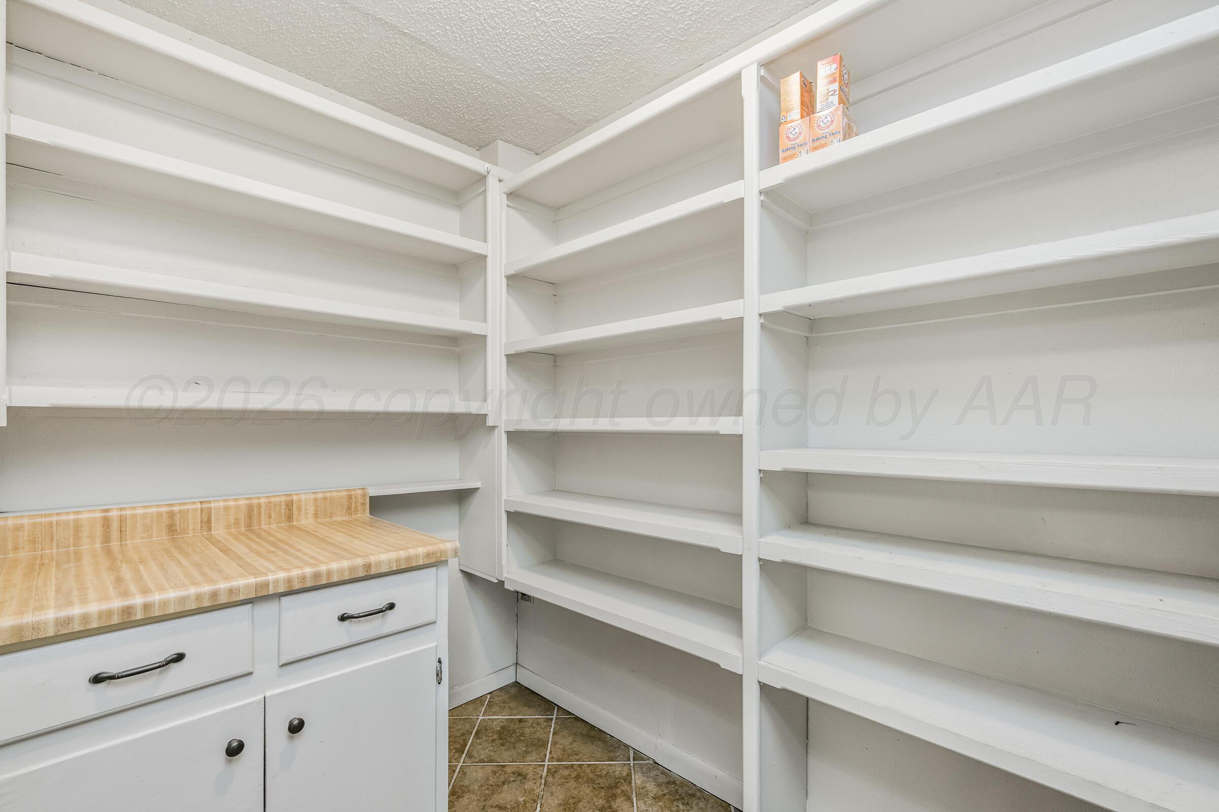 4400 West Farmers Avenue Amarillo, TX 79110 - Photo 13 of 27 a view of walk in closet with empty racks