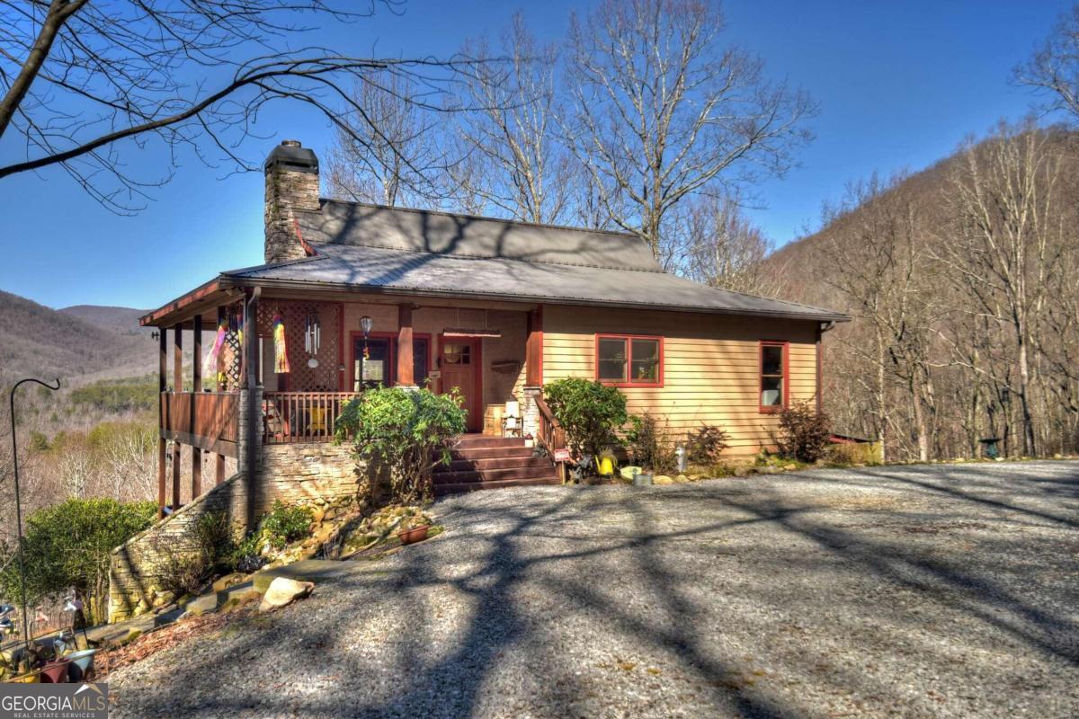 22 Prospectors Ridge Road Ellijay, GA 30536 - Photo 1 of 1 a front view of a house with a yard