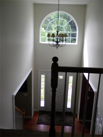 4 Fern Street Templeton, MA 01436 - Photo 15 of 30 a view of entryway and hall with wooden floor