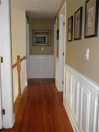 4 Fern Street Templeton, MA 01436 - Photo 16 of 30 a view of a hallway with wooden floor and stairs