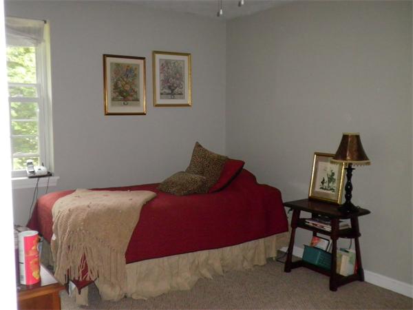 4 Fern Street Templeton, MA 01436 - Photo 18 of 30 a bed sitting in a bedroom next to a window