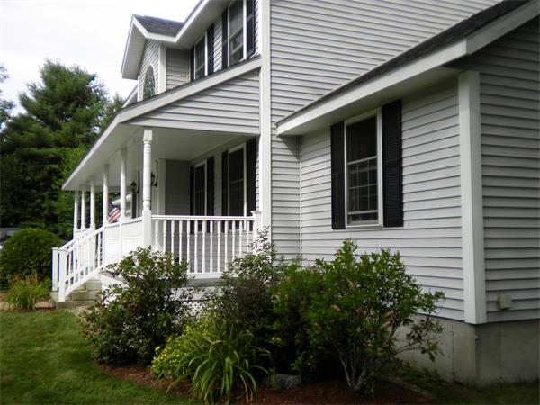 4 Fern Street Templeton, MA 01436 - Photo 26 of 30 a view of a house with a small yard and plants