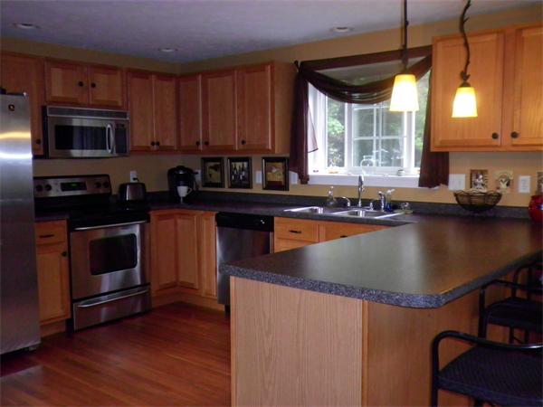 4 Fern Street Templeton, MA 01436 - Photo 3 of 30 a kitchen with stainless steel appliances granite countertop a sink a stove and a microwave
