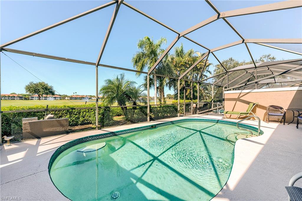 9049 Spring Run Boulevard Estero, FL 34135 - Photo 29 of 36 a view of swimming pool