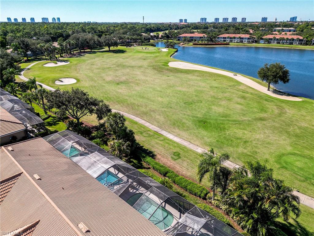 9049 Spring Run Boulevard Estero, FL 34135 - Photo 35 of 36 a view of a lake with a city view