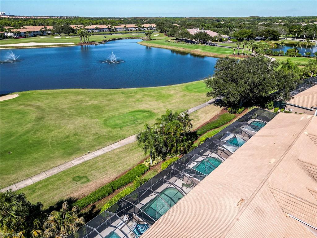 9049 Spring Run Boulevard Estero, FL 34135 - Photo 36 of 36 a view of a lake with a city view