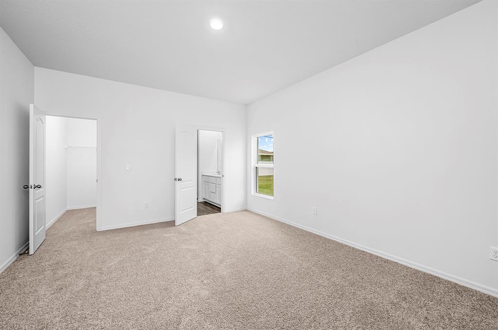 7886 99th Court Vero Beach, FL 32967 - Photo 11 of 18 a view of an empty room