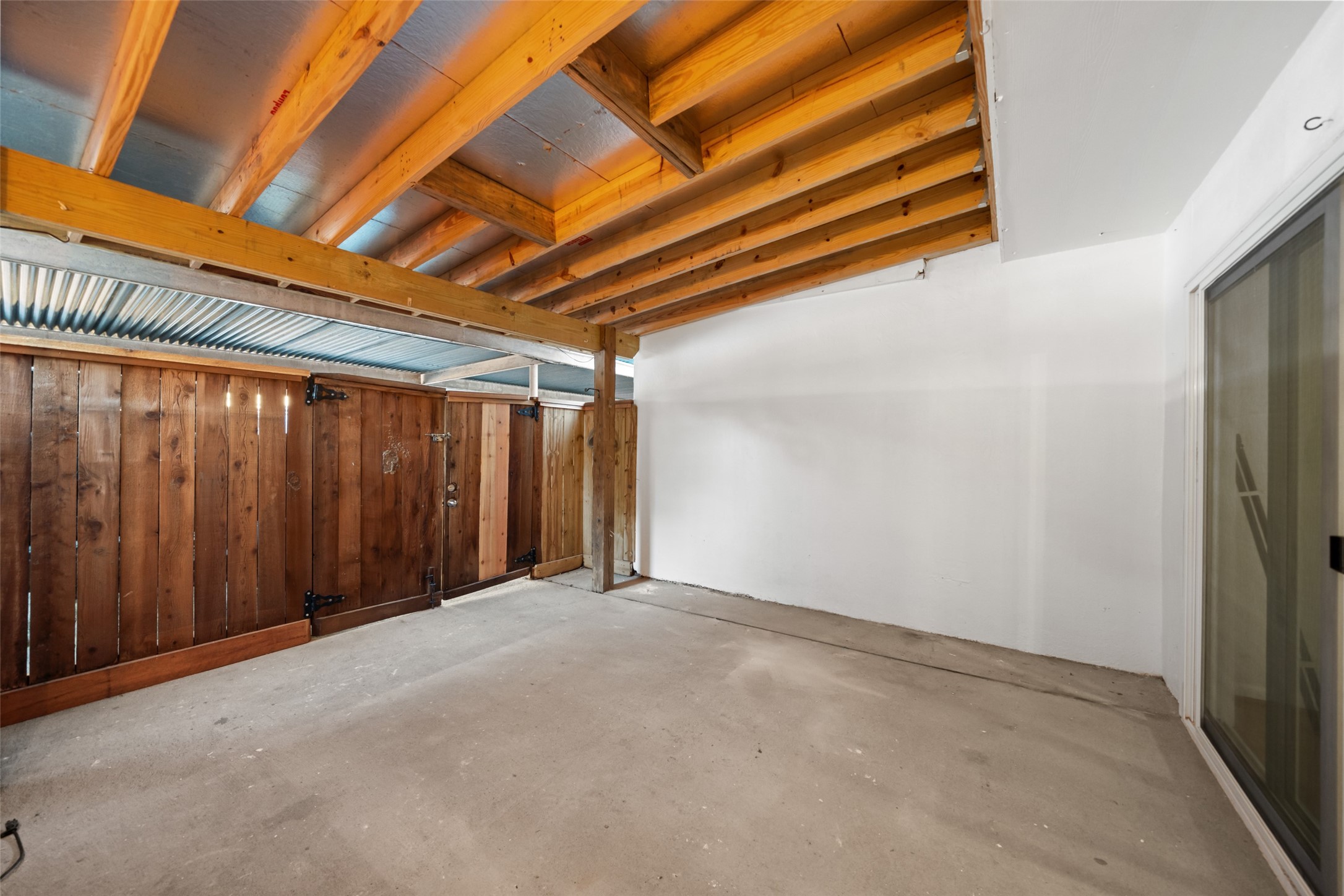 9654 Westview Drive, Unit 9 Houston, TX 77055 - Photo 33 of 47 Covered outdoor patio accessible from back Den