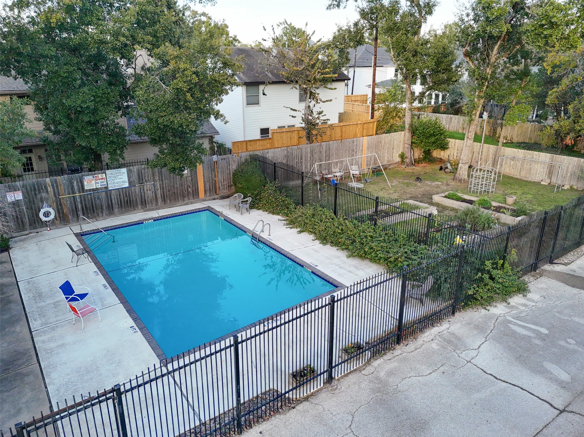 9654 Westview Drive, Unit 9 Houston, TX 77055 - Photo 37 of 47 Community Pool and Garden